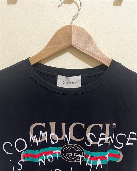 common sense is not that common gucci black|Gucci slogan tees history.